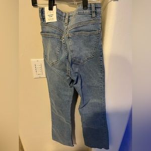 Zara, blue mid-rise jeans, with a slight flare